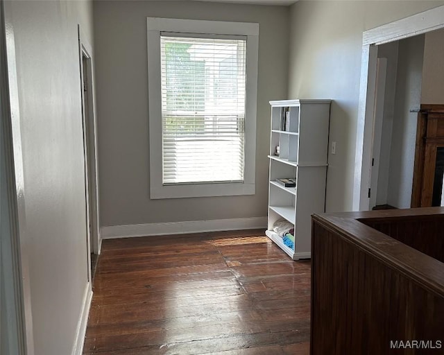 408 W Tuskeena St, Wetumpka, AL 36092 - unfurnished office featuring dark wood-style floors and baseboards