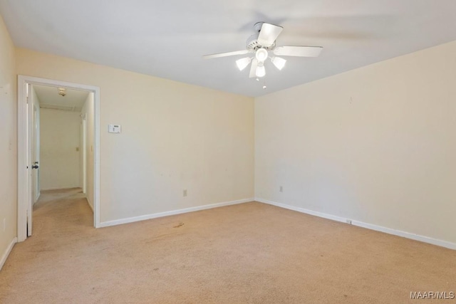 3158 Partridge Ln, Montgomery, AL 36111 - spare room with light colored carpet, a ceiling fan, baseboards, and attic access