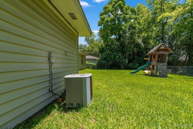 3158 Partridge Ln, Montgomery, AL 36111 - view of yard featuring central AC and a playground