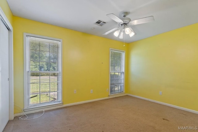 3158 Partridge Ln, Montgomery, AL 36111 - empty room with a ceiling fan, carpet flooring, and baseboards