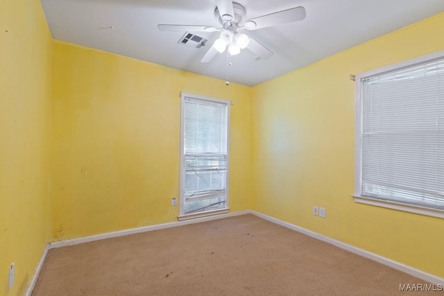 3158 Partridge Ln, Montgomery, AL 36111 - empty room with a ceiling fan, carpet flooring, and baseboards