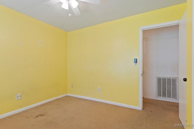 3158 Partridge Ln, Montgomery, AL 36111 - empty room with light colored carpet, a ceiling fan, and baseboards