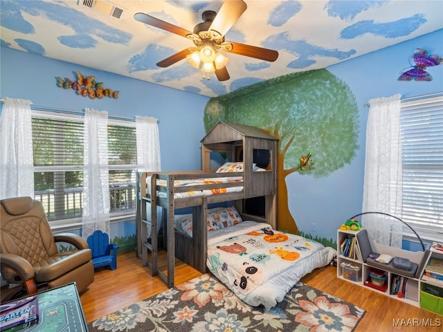 33 Glendale Acres Acres, Eclectic, AL 36024 - bedroom with wood finished floors and ceiling fan