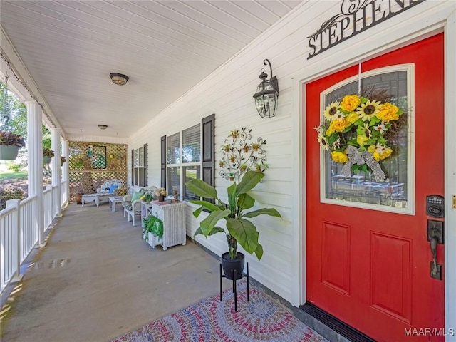 33 Glendale Acres Acres, Eclectic, AL 36024 - doorway to property with covered porch