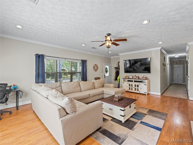 33 Glendale Acres Acres, Eclectic, AL 36024 - living area featuring ceiling fan, wood finished floors, recessed lighting, a textured ceiling, and baseboards