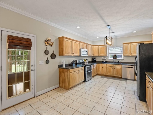 33 Glendale Acres Acres, Eclectic, AL 36024 - kitchen featuring stainless steel appliances, a sink, light tile patterned flooring, dark countertops, and crown molding