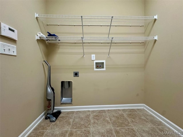 624 Stoneybrooke Way, Montgomery, AL 36117 - washroom featuring electric dryer hookup, hookup for a washing machine, baseboards, and tile patterned flooring