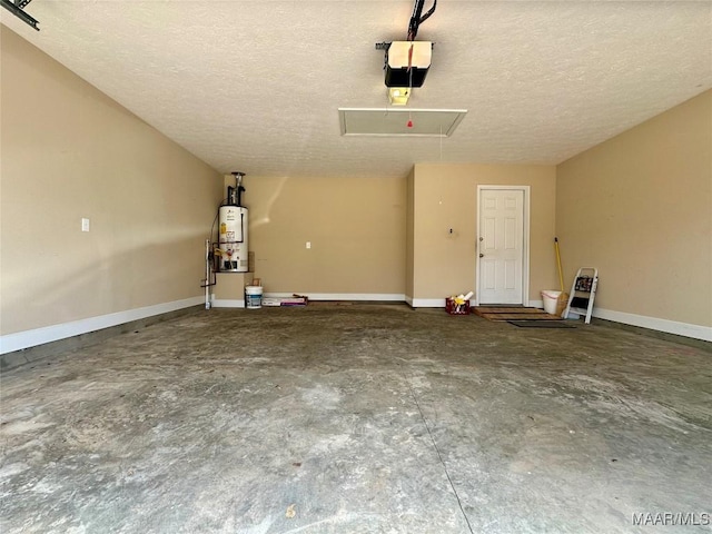 624 Stoneybrooke Way, Montgomery, AL 36117 - garage featuring gas water heater, a garage door opener, and baseboards
