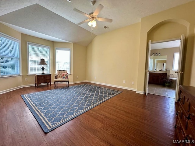 624 Stoneybrooke Way, Montgomery, AL 36117 - living area with wood finished floors, ceiling fan, healthy amount of natural light, baseboards, and a textured ceiling