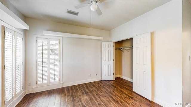8600 Willowbrook Ct, Montgomery, AL 36116 - unfurnished bedroom featuring dark wood-style floors, baseboards, ceiling fan, and a closet