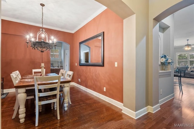 1900 Wyndgate Loop, Montgomery, AL 36117 - dining room featuring arched walkways, wood finished floors, ornamental molding, a chandelier, and baseboards