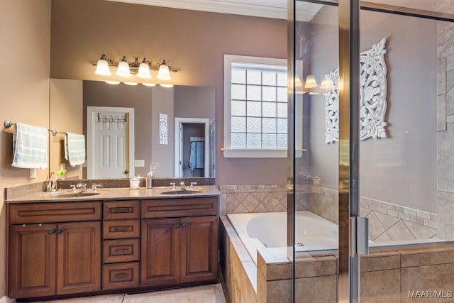 1900 Wyndgate Loop, Montgomery, AL 36117 - bathroom featuring a garden tub, double vanity, crown molding, and tiled shower
