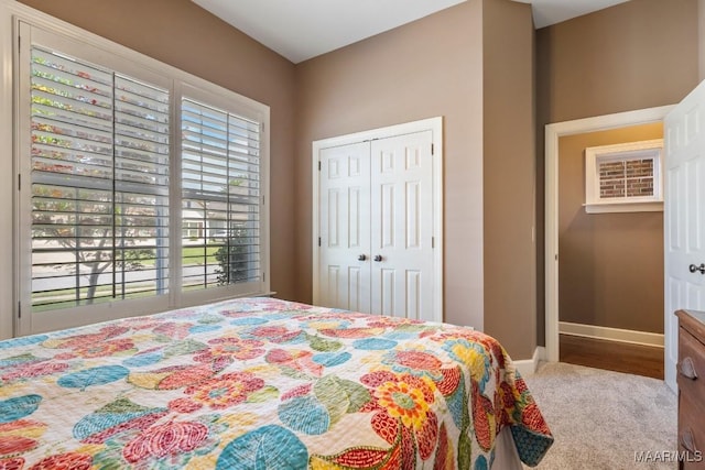1900 Wyndgate Loop, Montgomery, AL 36117 - bedroom with baseboards, a closet, and carpet floors