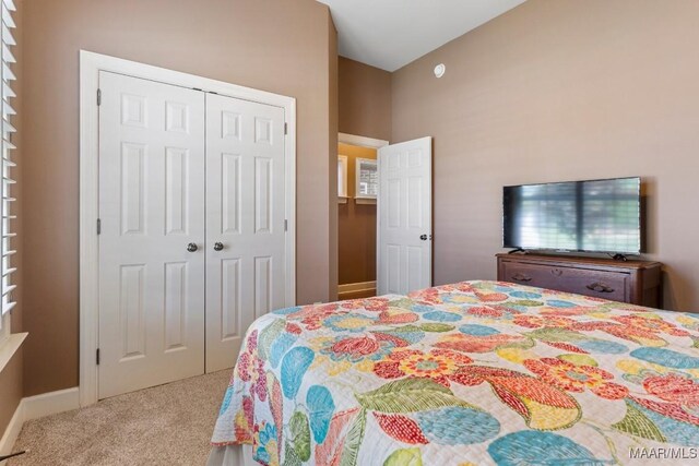 1900 Wyndgate Loop, Montgomery, AL 36117 - carpeted bedroom featuring a closet and baseboards