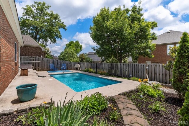 1900 Wyndgate Loop, Montgomery, AL 36117 - view of pool with a patio and a fenced backyard