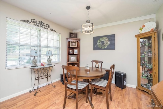 1505 Terrace Ct, Opelika, AL 36081 - dining area with a chandelier, plenty of natural light, light wood finished floors, and baseboards