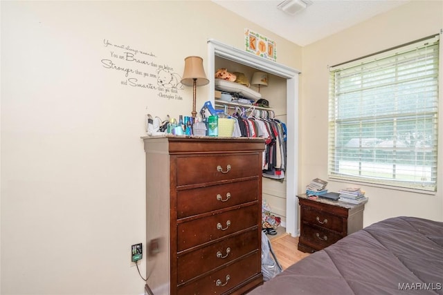 1505 Terrace Ct, Opelika, AL 36081 - bedroom featuring a closet and wood finished floors