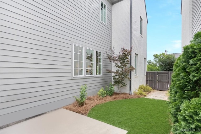 4808 Clerkenwell St, Montgomery, AL 36116 - view of side of home featuring a patio area and brick siding
