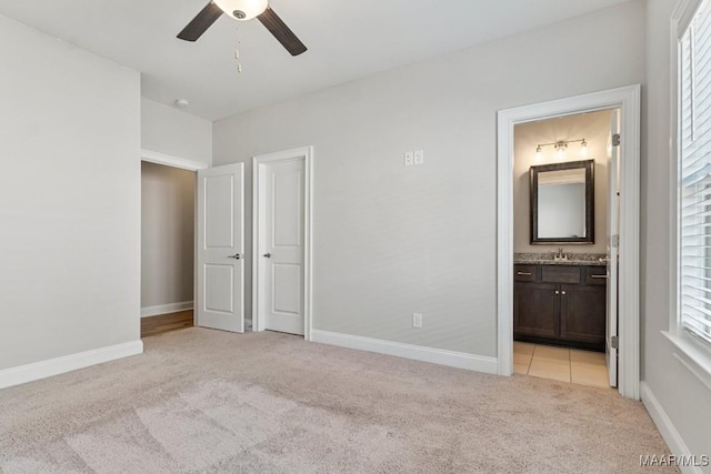 1420 Wildlife Way, Prattville, AL 36066 - unfurnished bedroom with light colored carpet, baseboards, ensuite bath, and ceiling fan