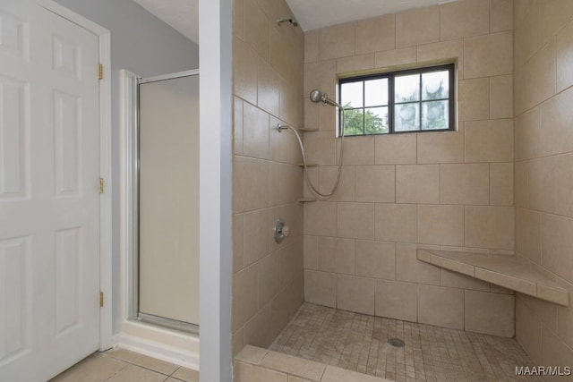 355 Hambleton Ct, Montgomery, AL 36117 - bathroom featuring a shower stall and tile patterned flooring