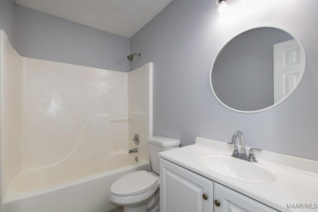 355 Hambleton Ct, Montgomery, AL 36117 - bathroom featuring toilet, vanity, washtub / shower combination, and a textured ceiling