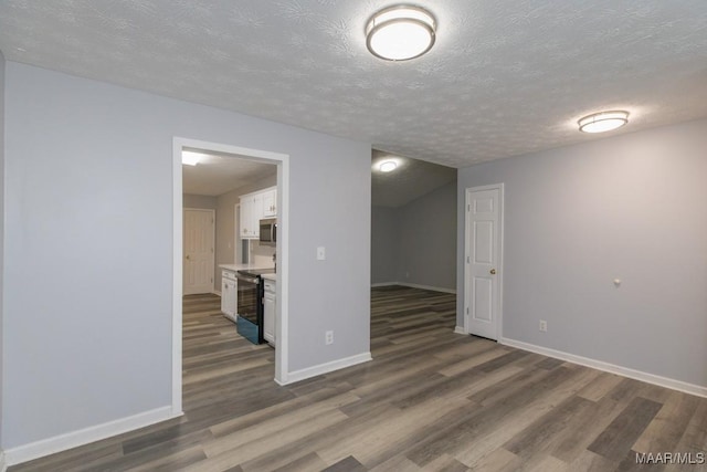 355 Hambleton Ct, Montgomery, AL 36117 - unfurnished room featuring wood finished floors, baseboards, and a textured ceiling