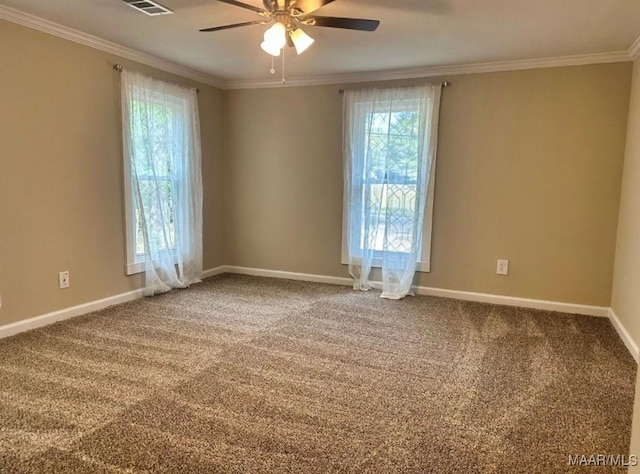 235 N Northington St, Prattville, AL 36067 - carpeted empty room featuring healthy amount of natural light, ornamental molding, ceiling fan, and baseboards