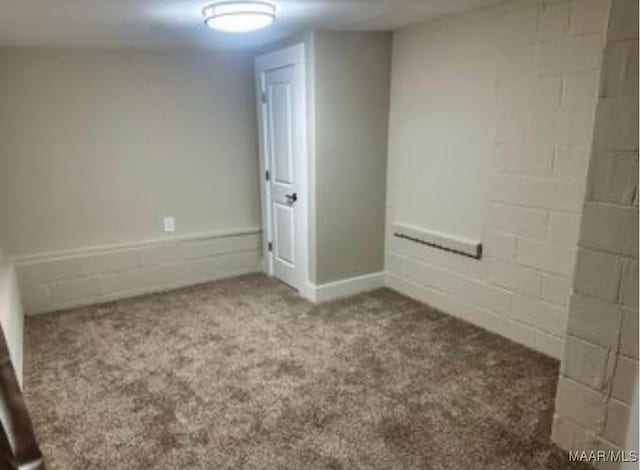 235 N Northington St, Prattville, AL 36067 - empty room featuring carpet floors, concrete block wall, and baseboards