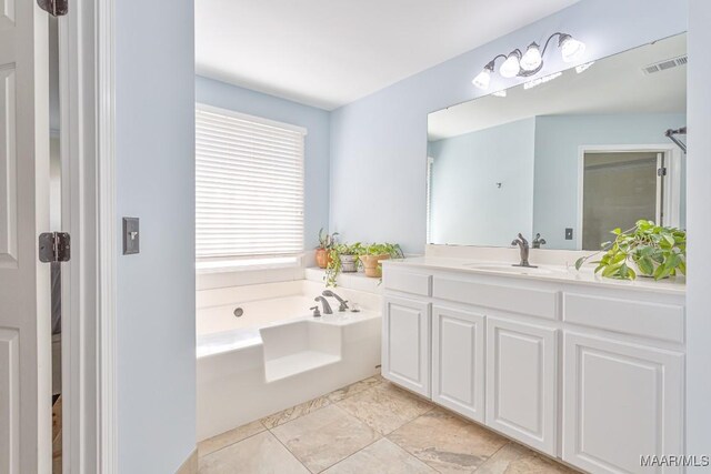 8115 Bridgewater Trce, Montgomery, AL 36117 - bathroom with vanity and a bath