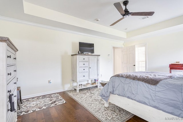 8115 Bridgewater Trce, Montgomery, AL 36117 - bedroom featuring dark wood-style flooring, baseboards, and a ceiling fan