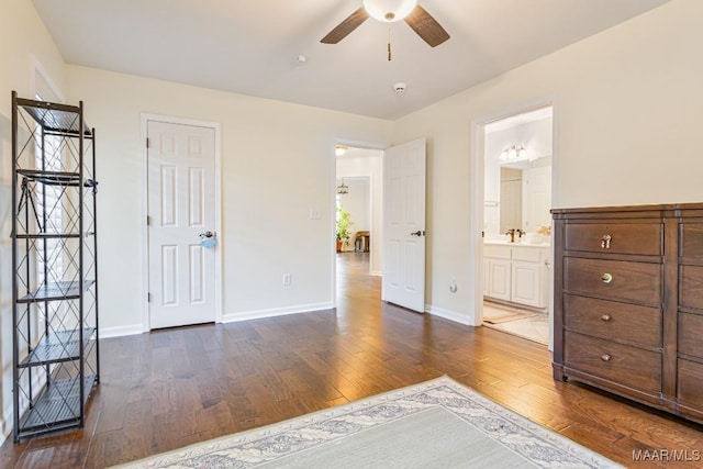 8115 Bridgewater Trce, Montgomery, AL 36117 - bedroom with dark wood-style floors, baseboards, ensuite bathroom, and a sink
