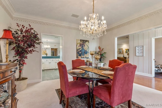 530 Old Mitylene Ct, Montgomery, AL 36117 - dining room featuring a chandelier, crown molding, and baseboards