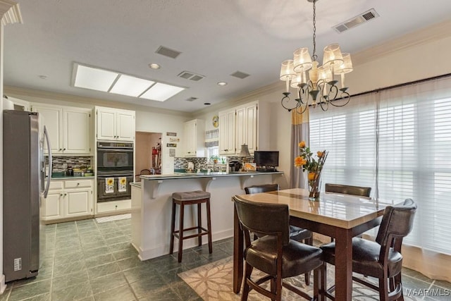 530 Old Mitylene Ct, Montgomery, AL 36117 - dining room with crown molding, a chandelier, and recessed lighting