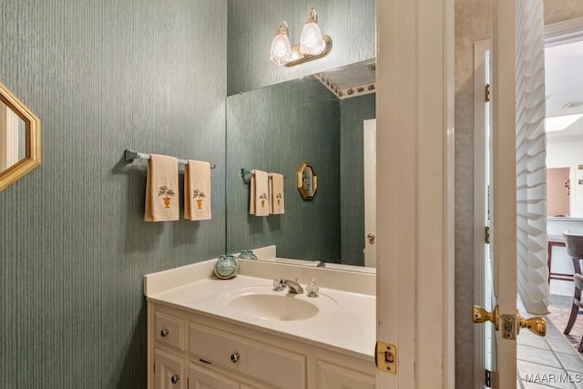 530 Old Mitylene Ct, Montgomery, AL 36117 - bathroom featuring vanity, wallpapered walls, and tile patterned flooring