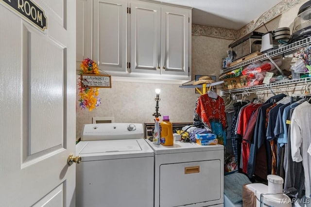 530 Old Mitylene Ct, Montgomery, AL 36117 - washroom featuring washer and clothes dryer, cabinet space, and wallpapered walls