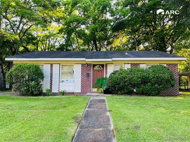 1734 Robison Hill Rd, Montgomery, AL 36107 - ranch-style house with brick siding and a front yard