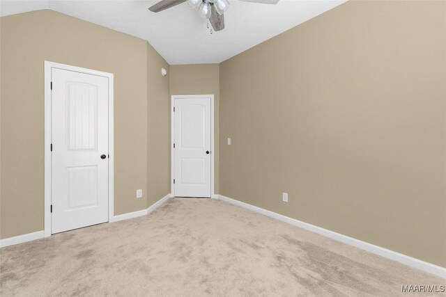 9000 Finsburry Ct, Montgomery, AL 36117 - unfurnished bedroom with light carpet, baseboards, ceiling fan, and vaulted ceiling