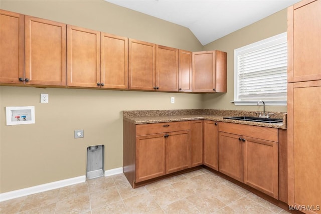 9000 Finsburry Ct, Montgomery, AL 36117 - kitchen featuring a sink, lofted ceiling, and baseboards