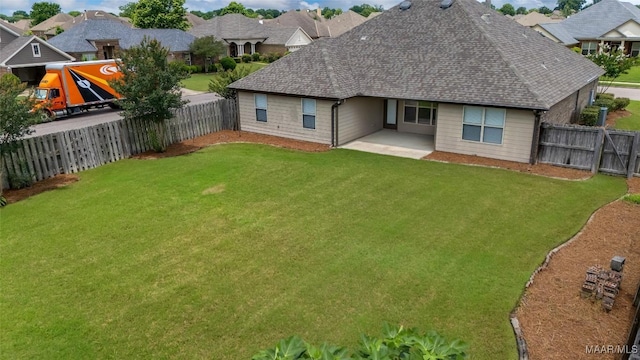 9000 Finsburry Ct, Montgomery, AL 36117 - rear view of house featuring a patio, a shingled roof, and a residential view