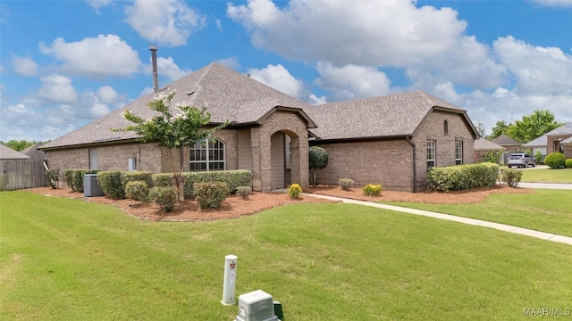 9000 Finsburry Ct, Montgomery, AL 36117 - view of front of home featuring brick siding, a front lawn, and roof with shingles