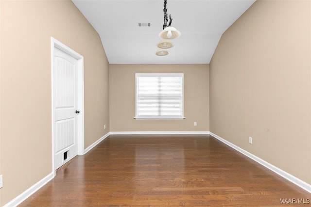 9000 Finsburry Ct, Montgomery, AL 36117 - empty room with wood finished floors, lofted ceiling, and baseboards