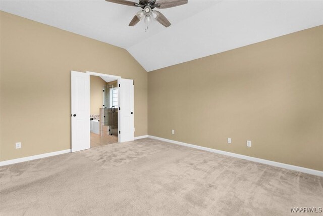 9000 Finsburry Ct, Montgomery, AL 36117 - spare room featuring a ceiling fan, baseboards, light carpet, and vaulted ceiling