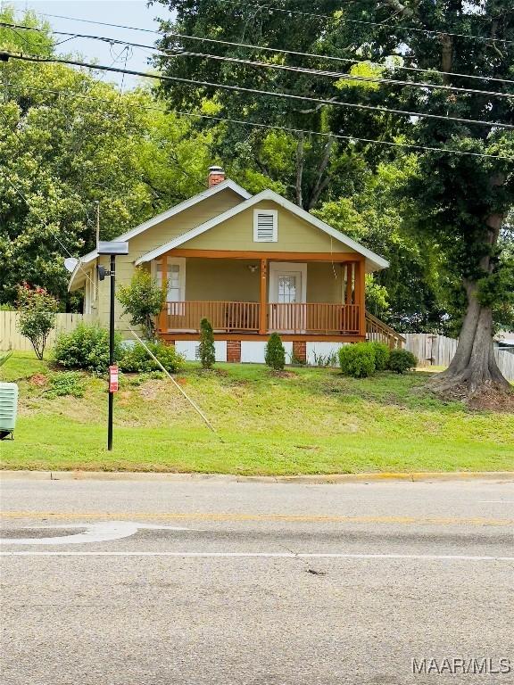 2829 Highland Ave, Montgomery, AL 36107 - bungalow featuring a porch and a chimney