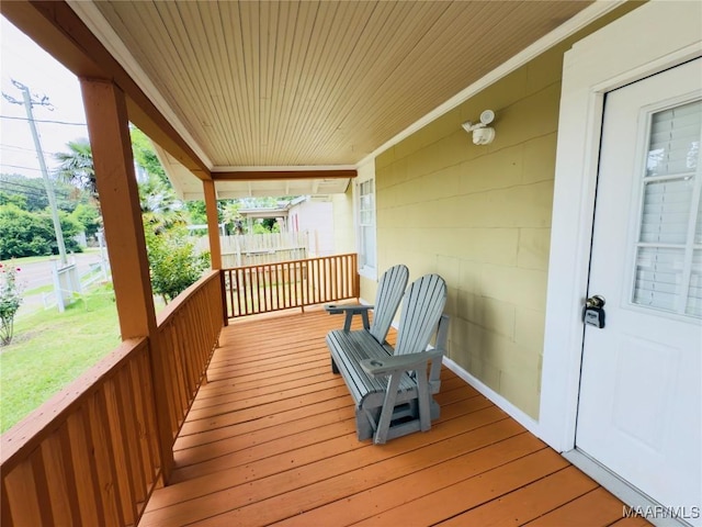 2829 Highland Ave, Montgomery, AL 36107 - wooden porch with a yard