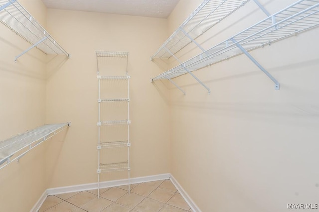 3049 Fieldcrest Dr, Montgomery, AL 36106 - spacious closet featuring light tile patterned flooring