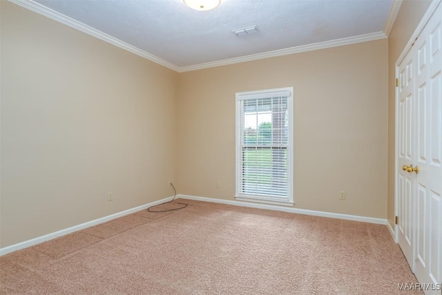 3049 Fieldcrest Dr, Montgomery, AL 36106 - unfurnished bedroom featuring crown molding, light colored carpet, baseboards, and a closet