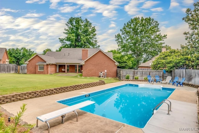 3049 Fieldcrest Dr, Montgomery, AL 36106 - view of pool featuring a patio and a diving board