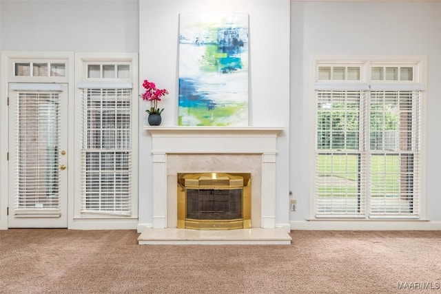 3049 Fieldcrest Dr, Montgomery, AL 36106 - unfurnished living room featuring carpet and a high end fireplace