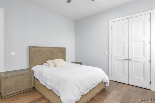 7175 Fain Park Loop, Montgomery, AL 36117 - bedroom with wood finished floors, a closet, and a ceiling fan