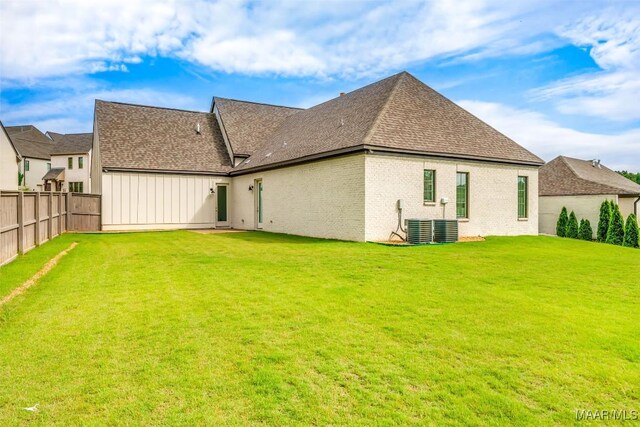 7175 Fain Park Loop, Montgomery, AL 36117 - back of house with a shingled roof, board and batten siding, and brick siding